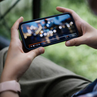 While quarantine a women watching live streaming by application on smartphone